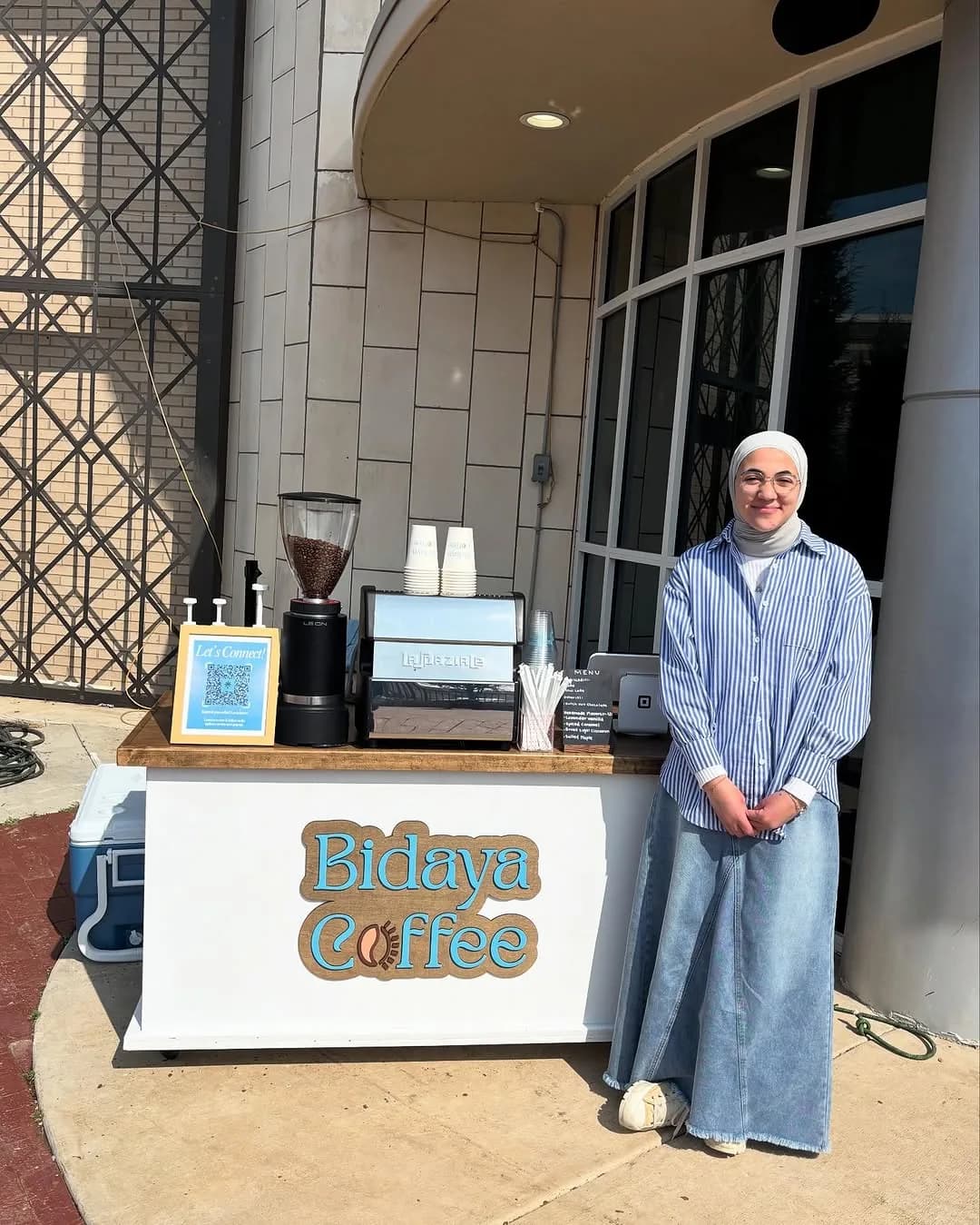 Bidaya Coffee founder Jannah Ahmed beside the mobile coffee cart